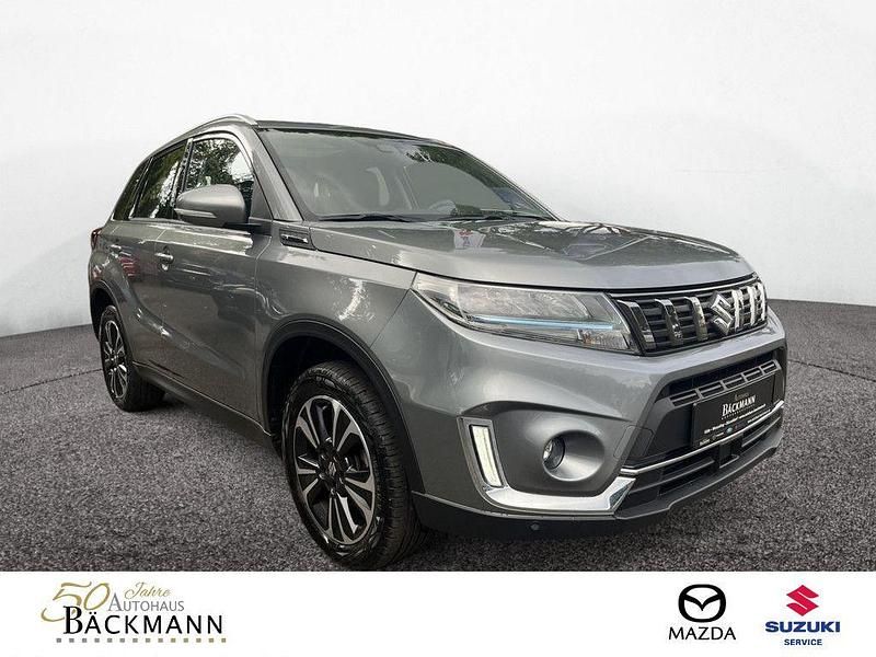 Grau Gebraucht 2023 Suzuki Vitara Comfort+ SUV | 19.450 € (Fairer Preis) - Bild 1/3