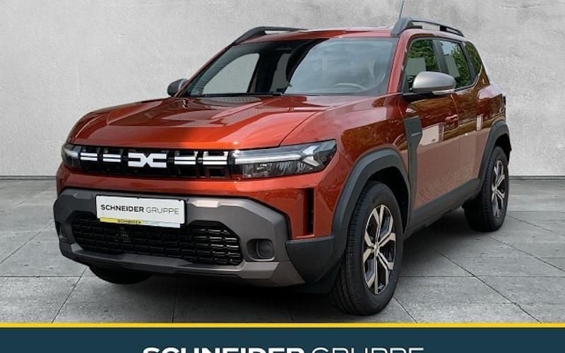 Braun Neu 2025 Dacia Duster Expression SUV | 21.980 € (Superpreis) - Bild 1/4