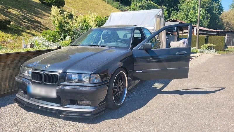 Second-hand BMW 323 170 CP (125 kW) 1995 Negru Berlinǎ