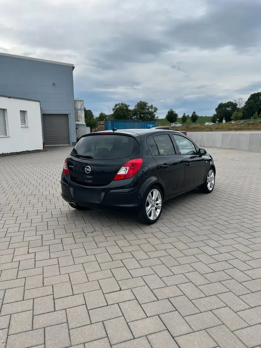 Gebraucht Opel Corsa Edition 101 PS (74 kW) 2013 Schwarz Kleinwagen