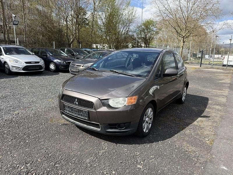 Gebraucht Mitsubishi Colt 95 PS (69 kW) 2011 Granitbraun (m) Kleinwagen