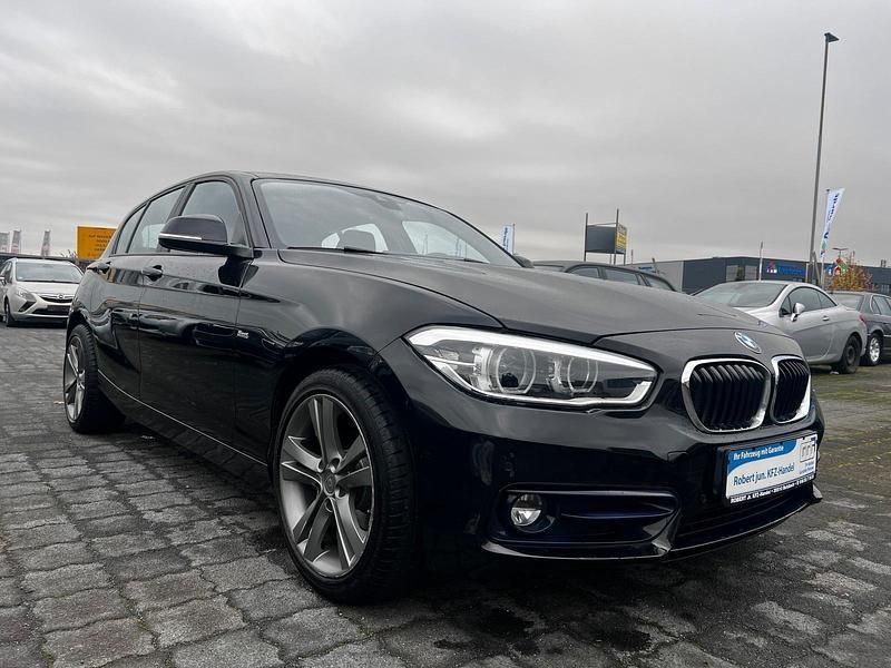Schwarz Gebraucht 2017 BMW 118 Sport Line Kleinwagen | 14.400 € (Fairer Preis) - Bild 1/4