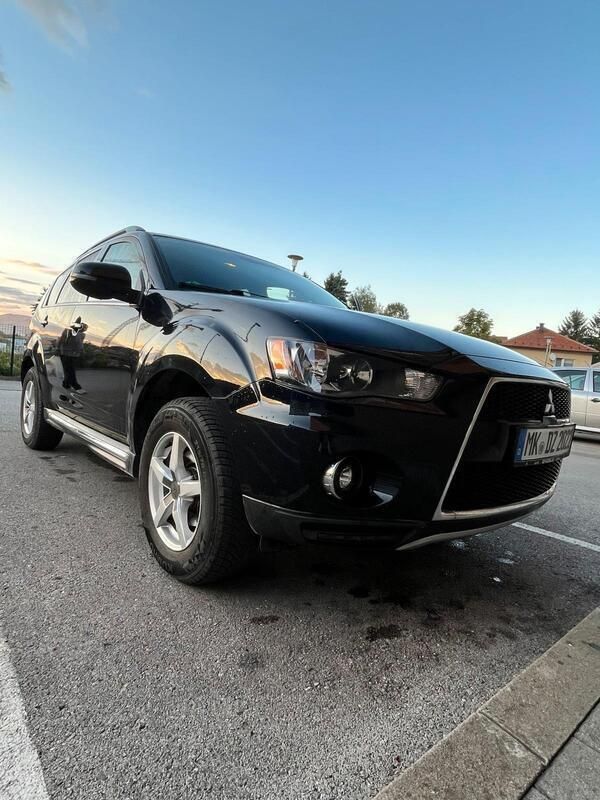Schwarz Gebraucht 2011 Mitsubishi Outlander SUV | 7.800 € - Bild 1/4
