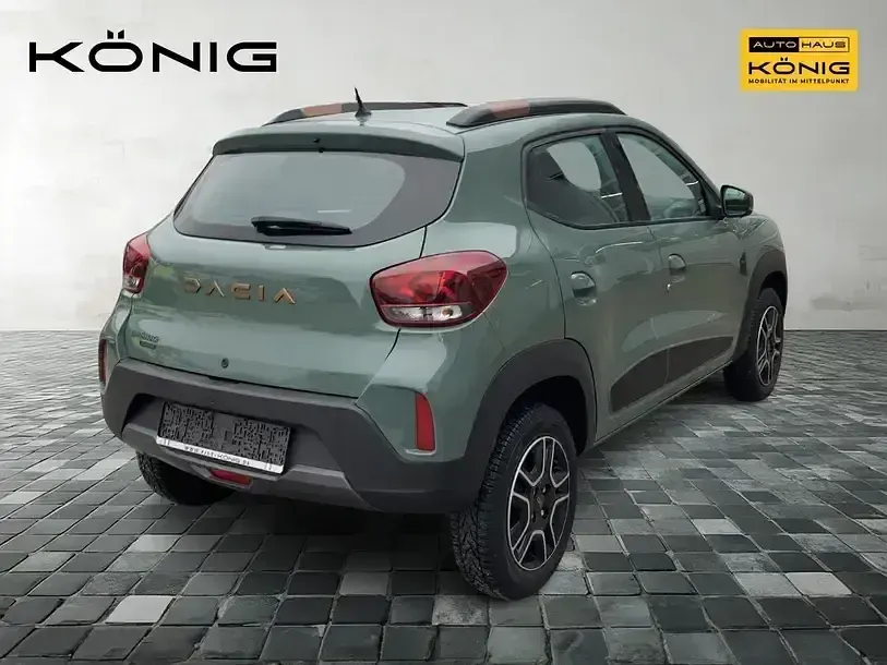 Gebraucht Dacia Spring Extreme 47 kW (65 PS) 2023 Olivgrün Kleinwagen