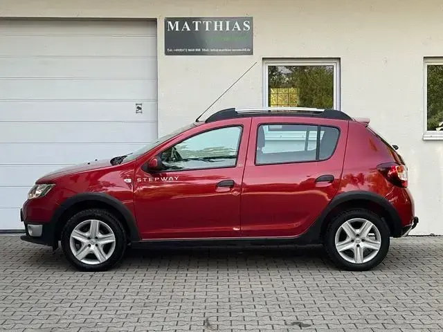 Gebraucht Dacia Sandero Prestige 90 PS (66 kW) 2016 Feuerrot SUV