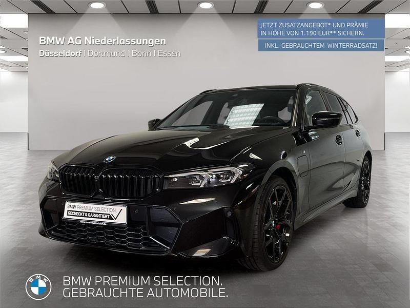 Schwarz Gebraucht 2024 BMW 330e M Sport Kombi | 54.999 € - Bild 1/2