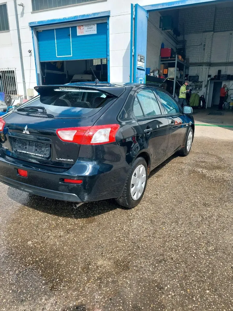 Second-hand Mitsubishi Lancer 109 CP (80 kW) 2010 Negru Berlinǎ