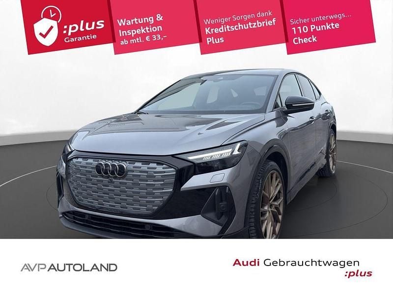 Grau Gebraucht 2022 Audi Q4 Sportback e-tron Sport SUV | 29.960 € (Fairer Preis) - Bild 1/4