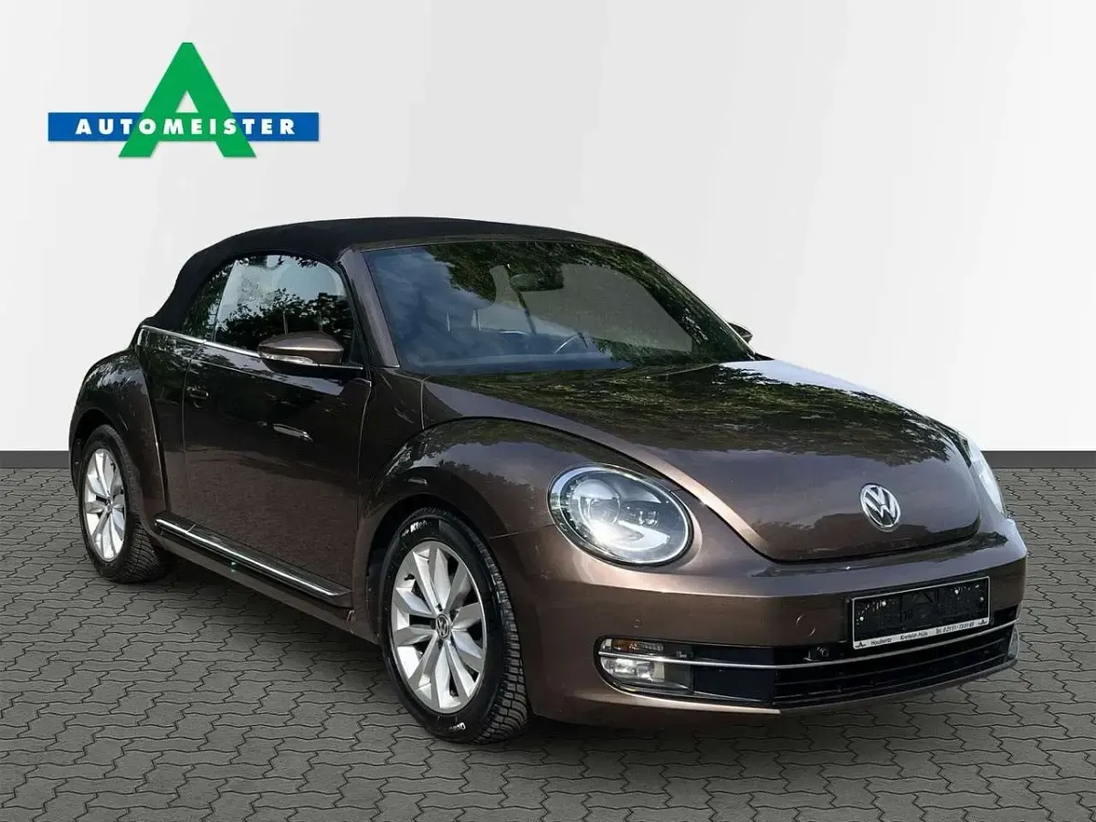 Używany VW Beetle Cabriolet Design 105 KM (77 kW) 2013 Brązowy Kabriolet