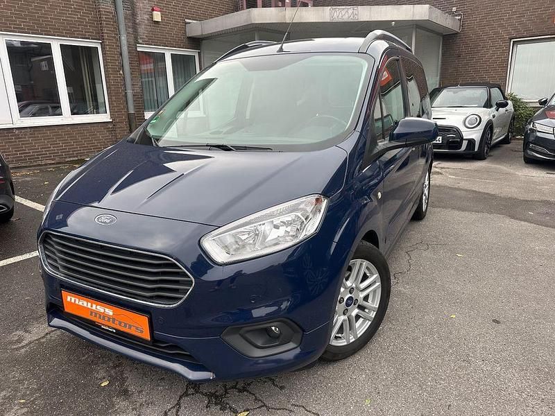 Blau Gebraucht 2020 Ford Tourneo Courier Titanium Van / Kleinbus | 9.880 € (Superpreis) - Bild 1/4
