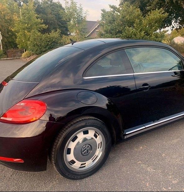 Gebraucht VW Beetle 105 PS (77 kW) 2011 Schwarz Kleinwagen