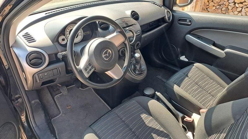Gebraucht Mazda 2 Inclusive 75 PS (55 kW) 2008 Schwarz Kleinwagen