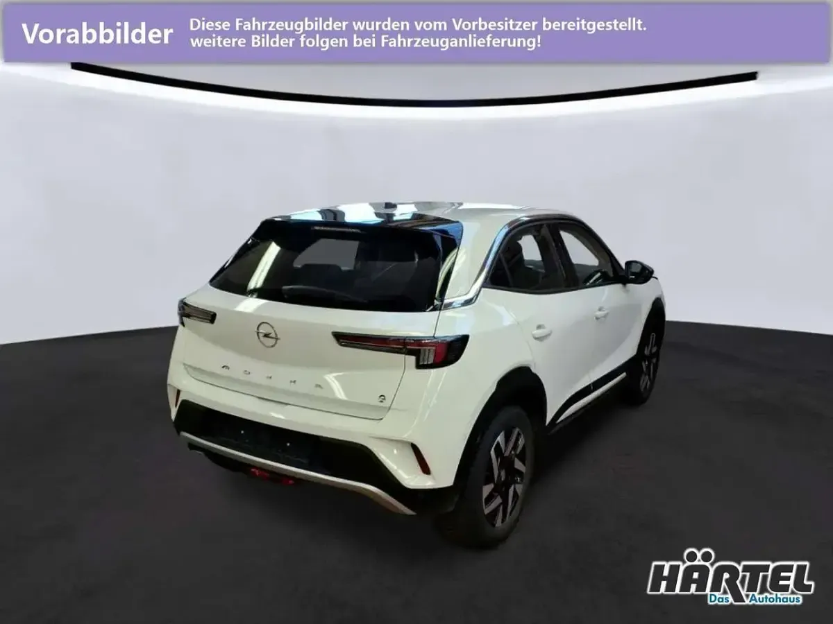 Gebraucht Opel Mokka-e Elegance 100 kW (136 PS) 2022 Jade weiß (white), metallic SUV