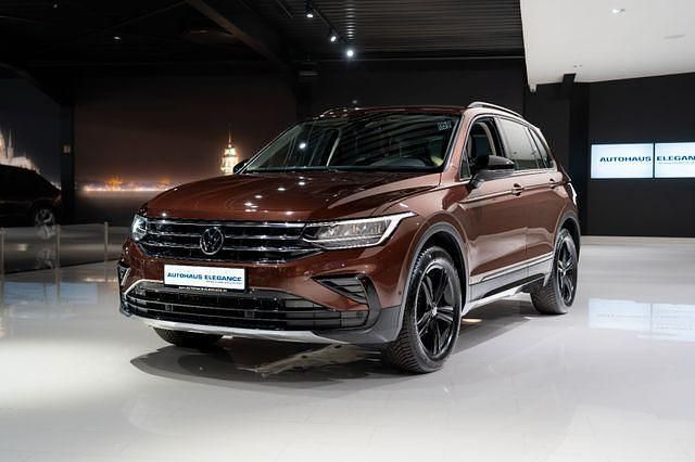 Ginger brown metallic Gebraucht 2022 VW Tiguan Business SUV | 23.980 € (Fairer Preis) - Bild 1/4