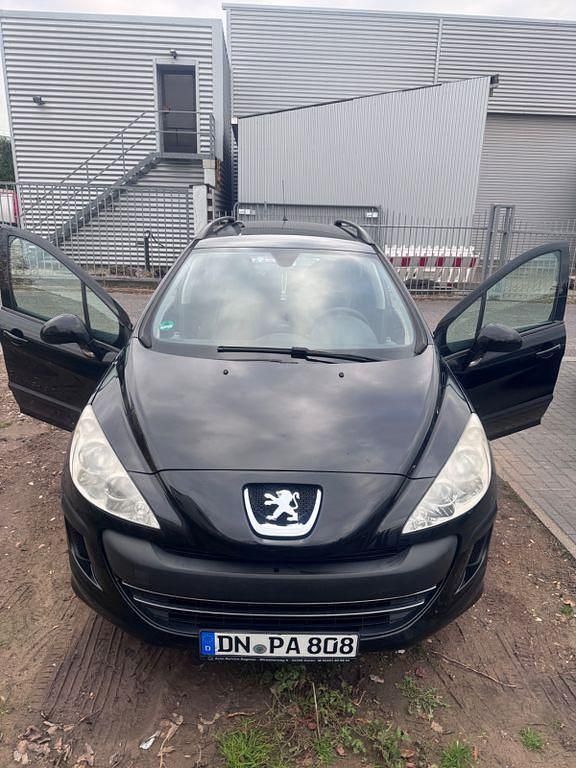 Gebraucht Peugeot 308 SW Tendance 90 PS (66 kW) 2010 Schwarz Kombi