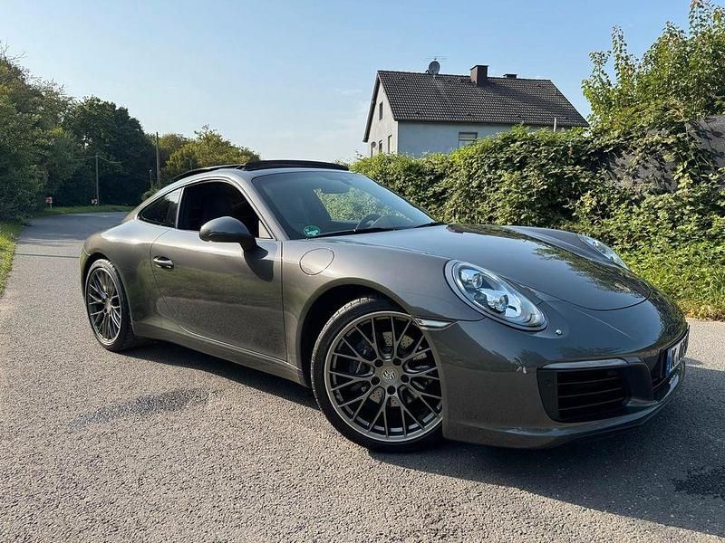 Grau Gebraucht 2018 Porsche 911 Carrera Sport Coupé | 86.990 € - Bild 1/4