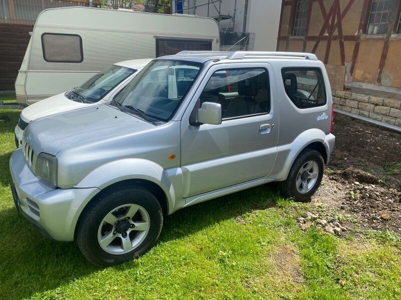 Silber Gebraucht 2006 Suzuki Jimny Snow SUV | 4.600 € (Superpreis) - Bild 1/4