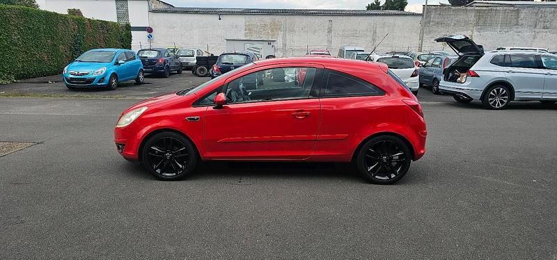 Gebraucht Opel Corsa 80 PS (58 kW) 2007 Magma rot (b) Kleinwagen