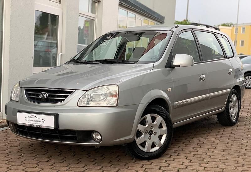 Silber Gebraucht 2003 Kia Carens EX Van / Kleinbus | 2.300 € - Bild 1/4