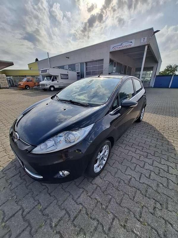 Schwarz Gebraucht 2012 Ford Fiesta Titanium Kleinwagen | 4.999 € (Fairer Preis) - Bild 1/4