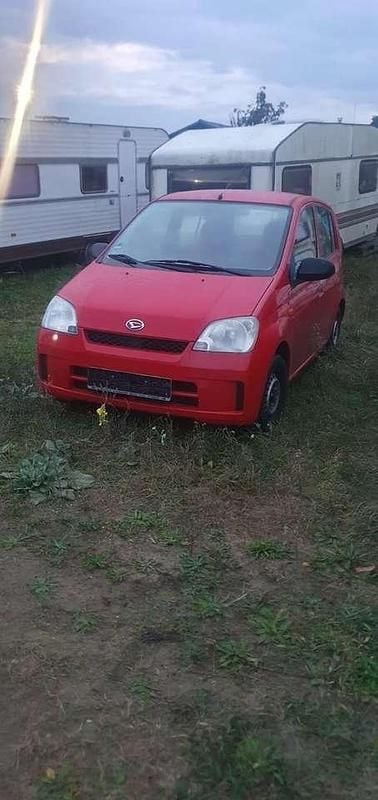 Gebraucht Daihatsu Cuore Plus 58 PS (42 kW) 2003 Rot Kleinwagen