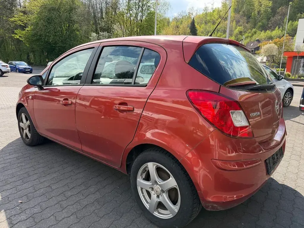 Gebraucht Opel Corsa Active 86 PS (63 kW) 2013 Orange Kleinwagen