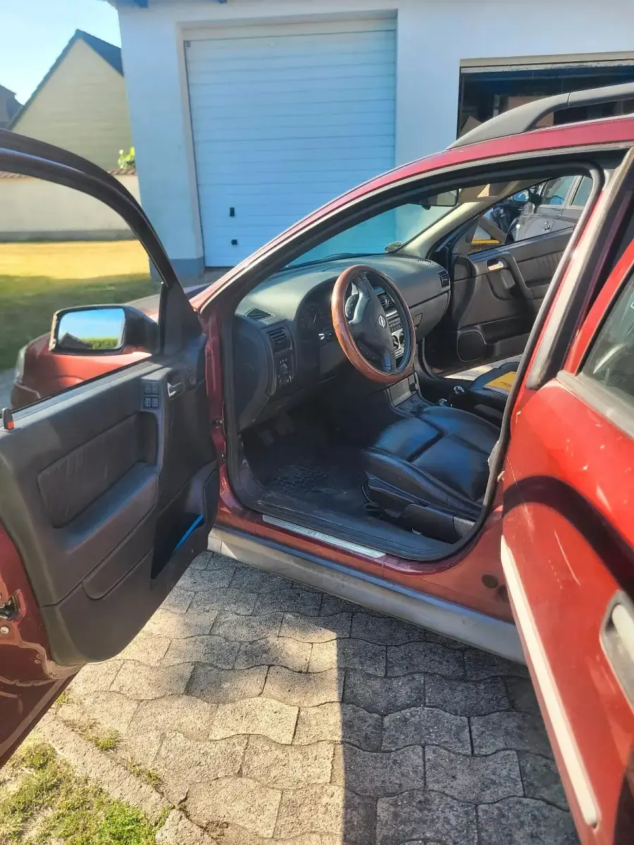 Gebraucht Opel Astra 101 PS (74 kW) 1999 Rot Kombi