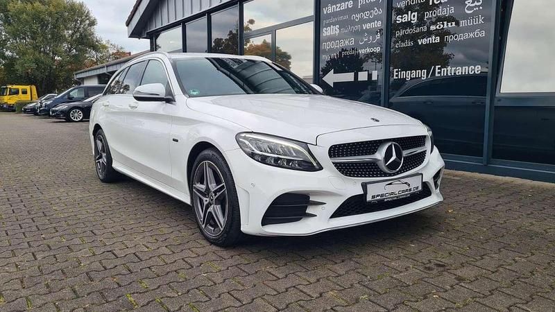 Polarweiss Gebraucht 2020 Mercedes C300e AMG line Kombi | 22.990 € (Fairer Preis) - Bild 1/4