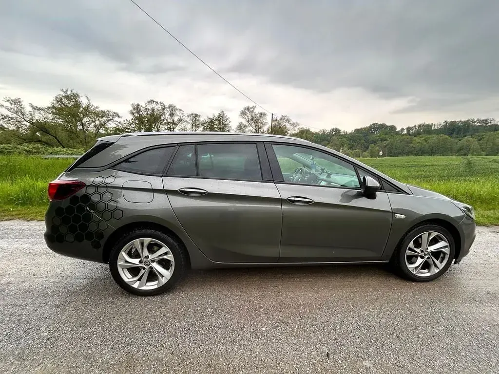 Używany Opel Astra 125 KM (91 kW) 2018 Szary Kombi