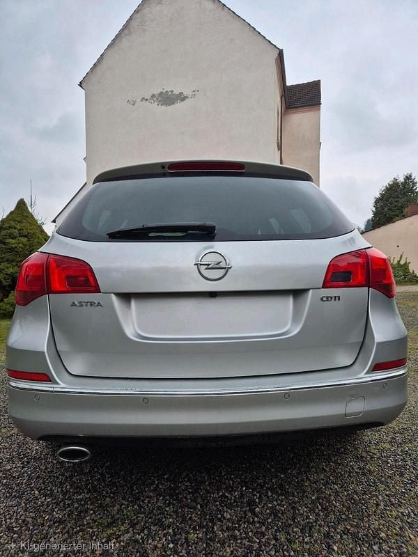 Second-hand Opel Astra 165 CP (121 kW) 2014 Argintiu Break