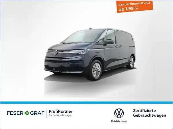 Starlight blue metallic Gebraucht 2024 VW Multivan Van / Kleinbus | 47.888 € (Guter Preis) - Bild 1/4