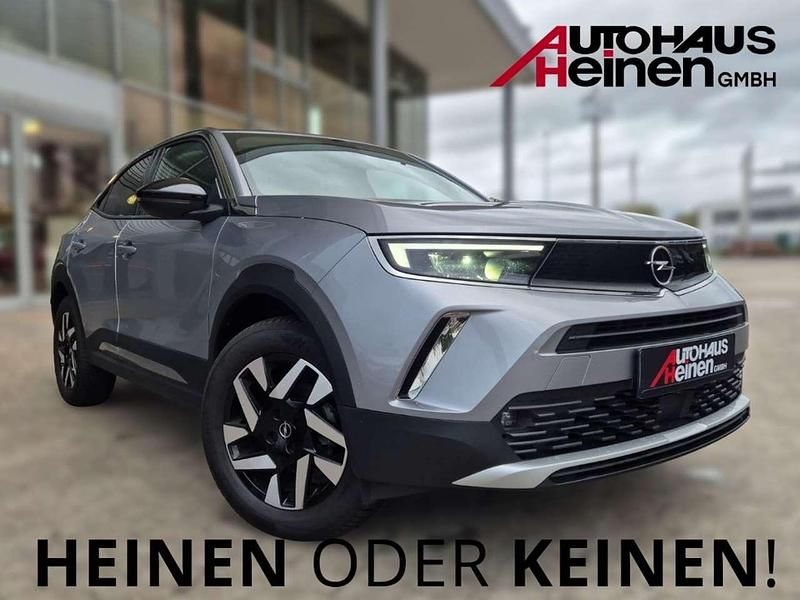 Gebraucht Opel Mokka Elegance 131 PS (96 kW) 2022 Kontrast grau/quarz silber SUV