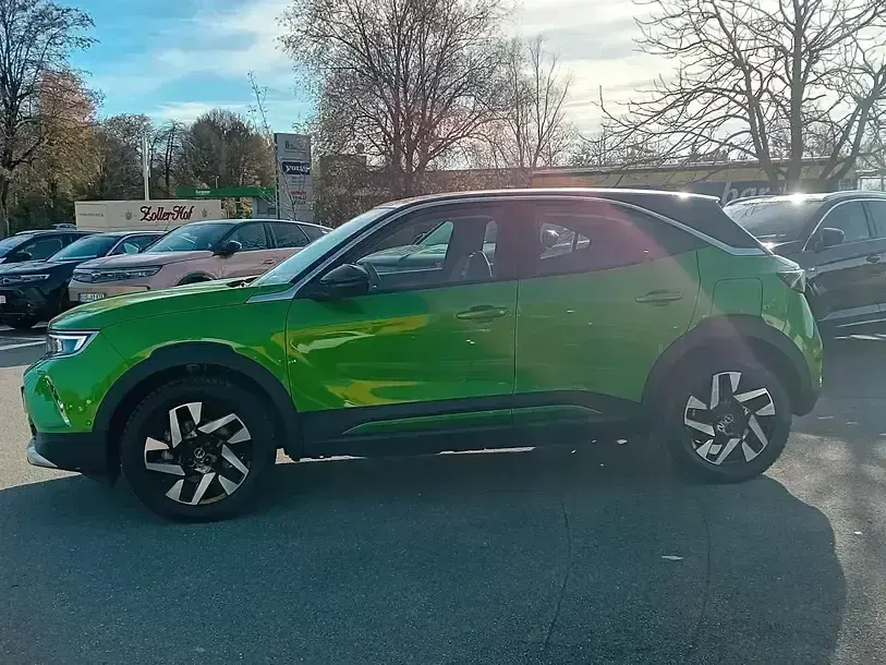 Gebraucht Opel Mokka-e Elegance 100 kW (136 PS) 2022 Matcha green/ikone gruen SUV