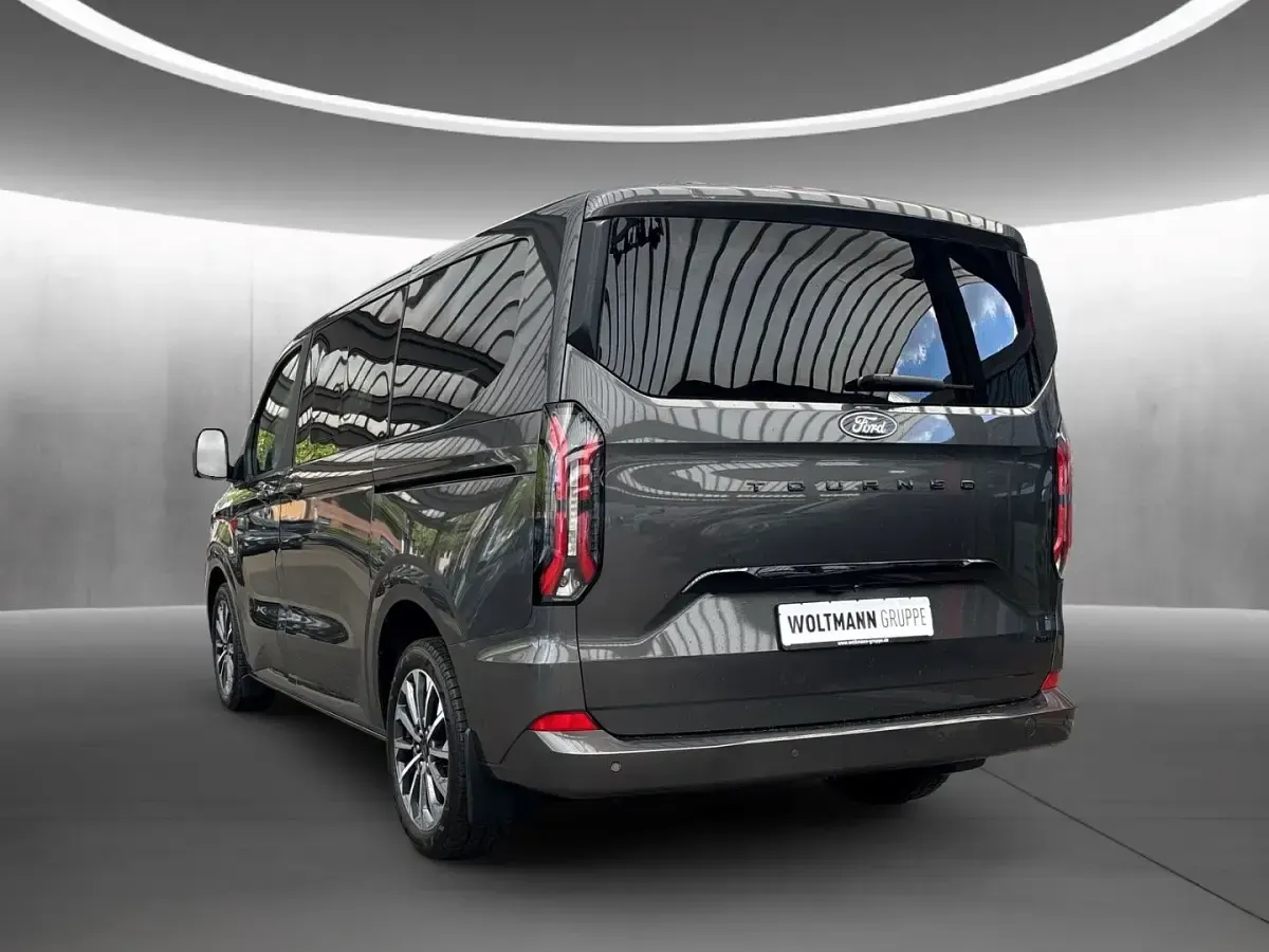 Gebraucht Ford Tourneo Custom Titanium X 170 PS (125 kW) 2025 Magneticgrau (metallic) Van