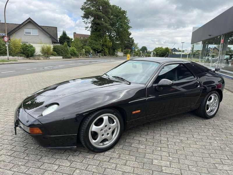 Schwarzperlcolor (metallic) Gebraucht 1993 Porsche 928 Coupé | 65.928 € - Bild 1/4
