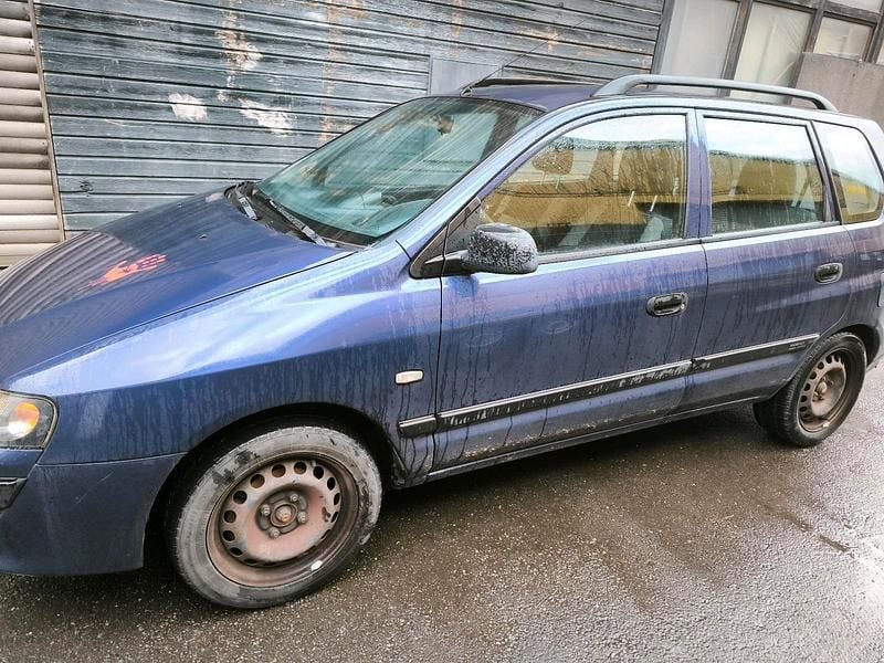 Second-hand Mitsubishi Space Star 97 CP (71 kW) 2003 Albastru Monovolum