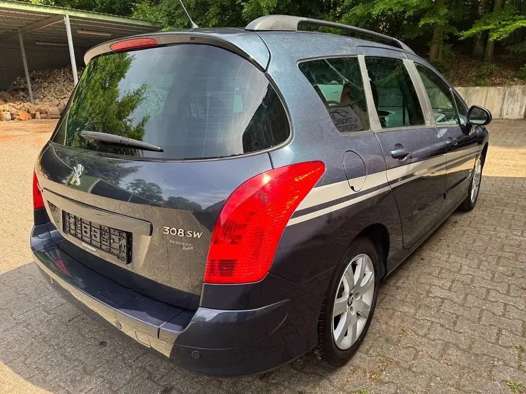 Gebraucht Peugeot 308 SW Style 120 PS (88 kW) 2013 Blau Kombi