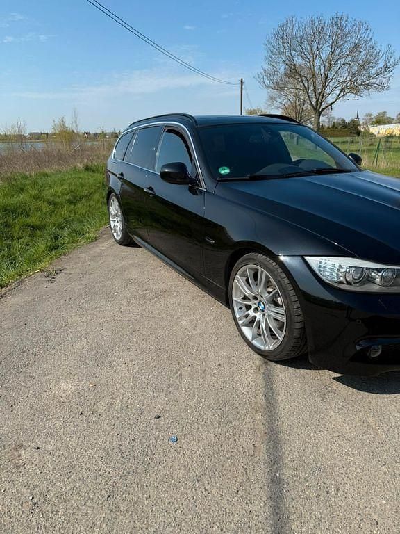 Second-hand BMW 325 Performance 204 CP (150 kW) 2011 Negru Break