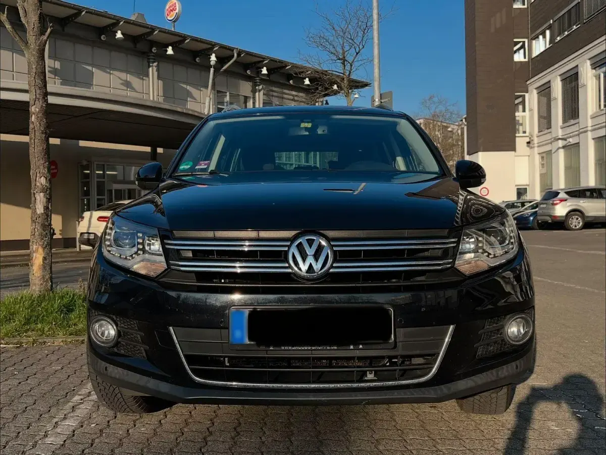 Second-hand VW Tiguan Sportline 160 CP (117 kW) 2014 Negru SUV