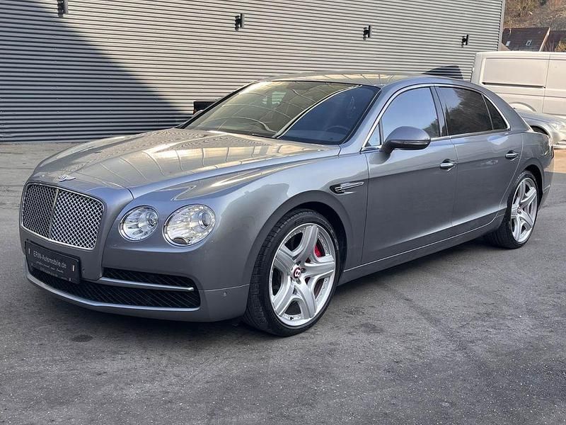 Grau Gebraucht 2014 Bentley Flying Spur Mulliner Limousine | 62.999 € - Bild 1/4