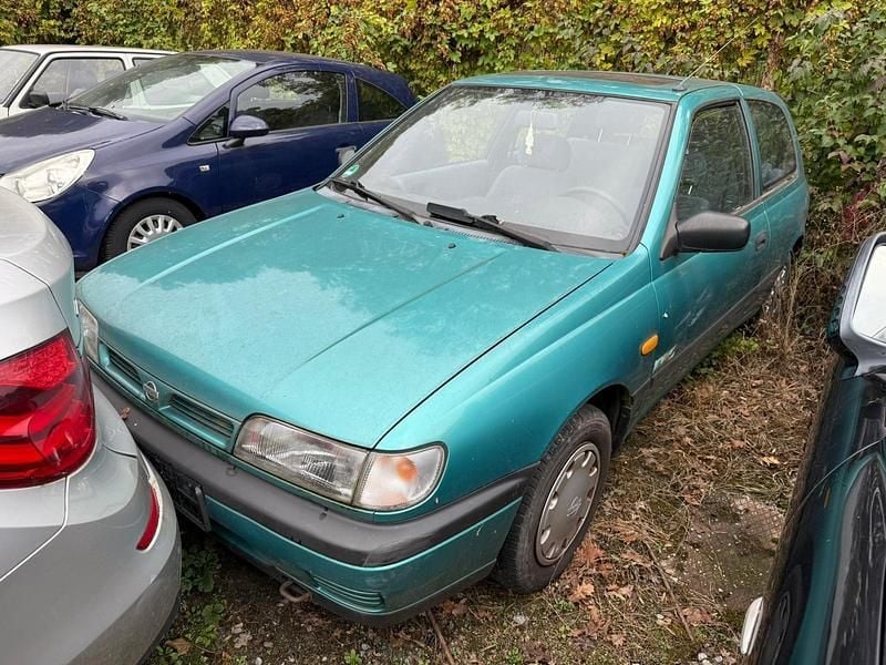Grün Gebraucht 1994 Nissan Sunny Kleinwagen | 650 € - Bild 1/4