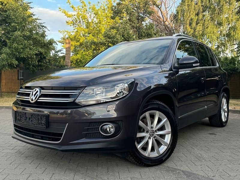 Grau Gebraucht 2015 VW Tiguan LOUNGE SUV | 10.299 € (Guter Preis) - Bild 1/4