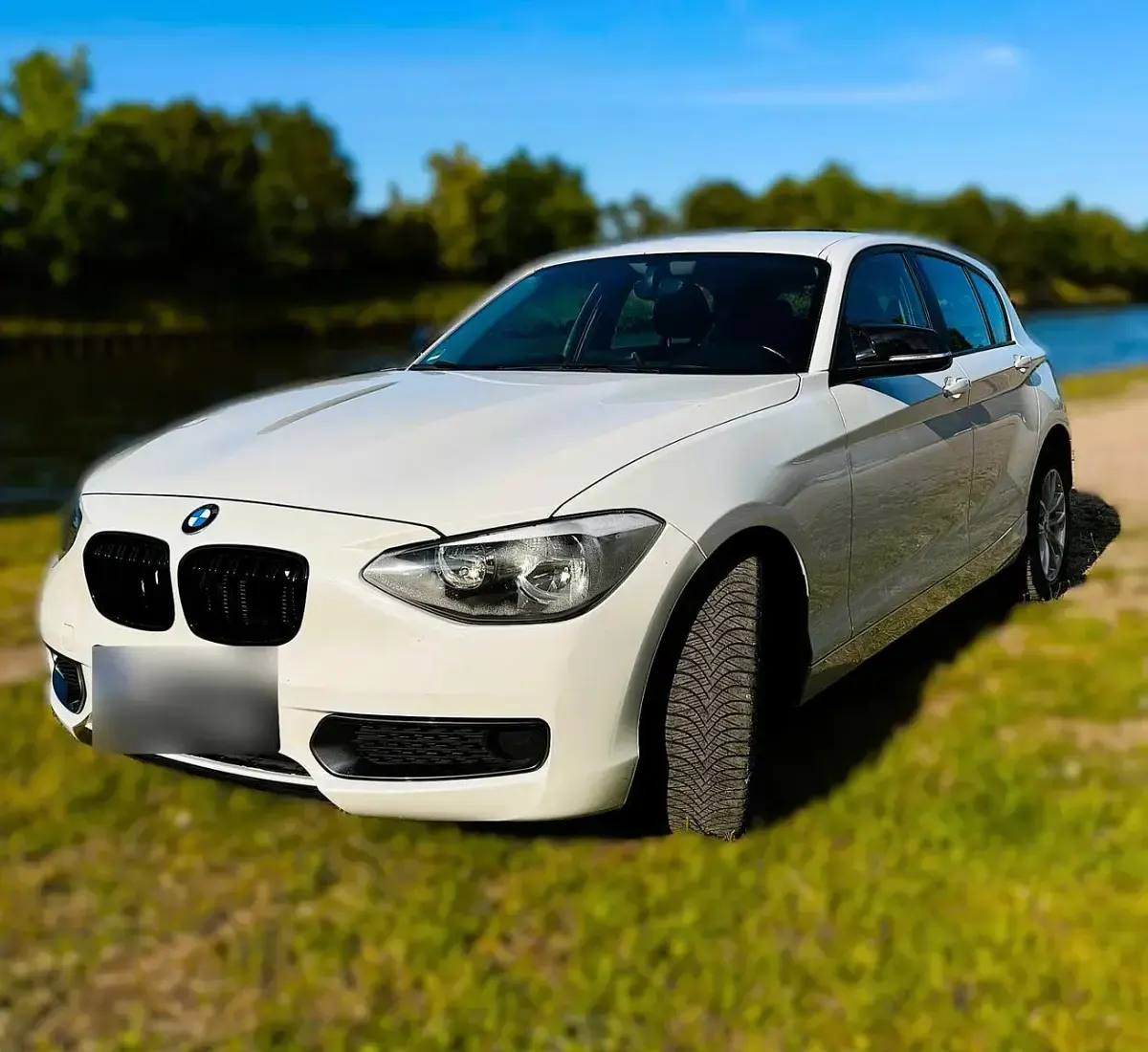 Gebraucht BMW 116 Sport Line 136 PS (100 kW) 2014 Weiß Kleinwagen