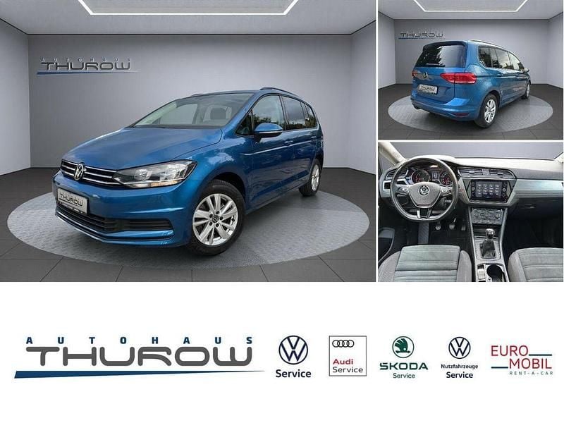 Caribbean blue metallic Gebraucht 2020 VW Touran Comfortline Van / Kleinbus | 22.900 € (Fairer Preis) - Bild 1/4