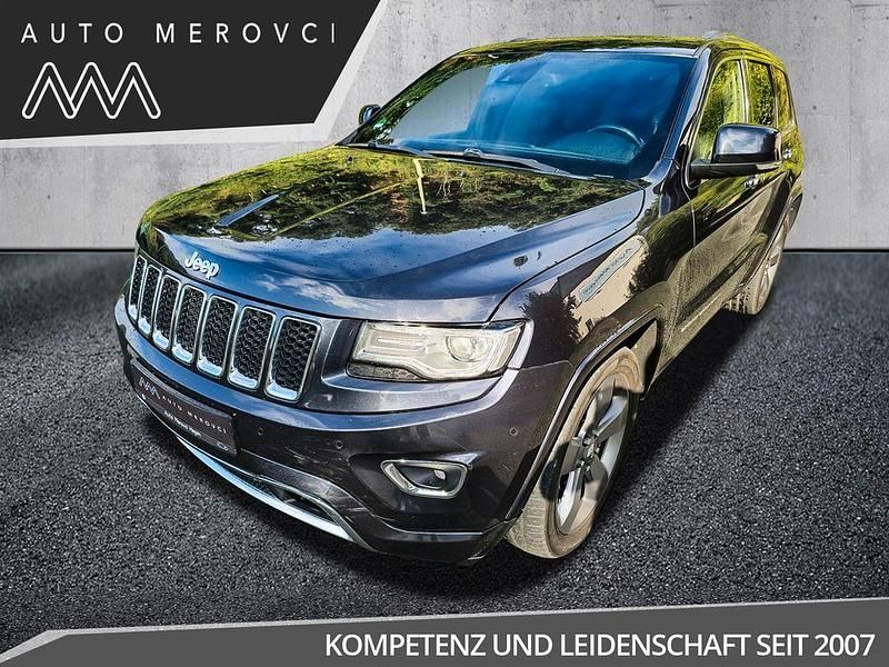 Grau Gebraucht 2013 Jeep Grand Cherokee Overland SUV | 15.795 € (Fairer Preis) - Bild 1/4