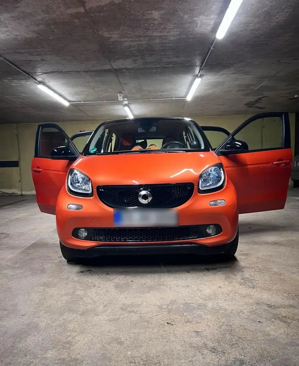 Gebraucht Smart ForFour Passion 90 PS (66 kW) 2015 Orange Kleinwagen