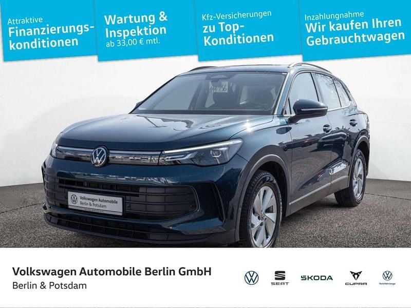 Nightshade blue metallic Gebraucht 2024 VW Tiguan Basis SUV | 34.655 € (Superpreis) - Bild 1/4