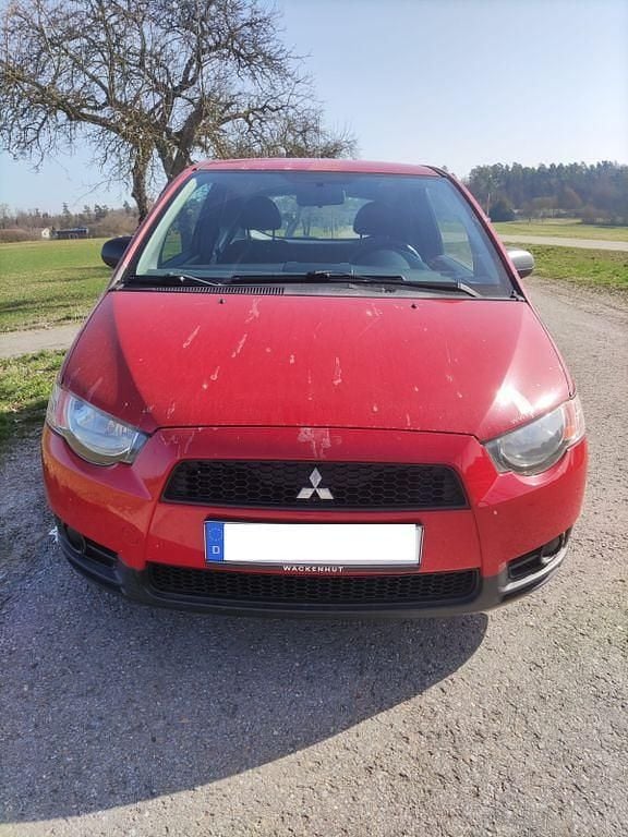 Gebraucht Mitsubishi Colt 75 PS (55 kW) 2013 Rot Kleinwagen