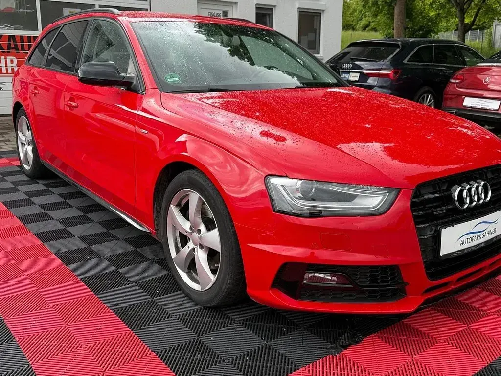 Używany Audi A4 Ambition 170 KM (125 kW) 2015 Czerwony Kombi