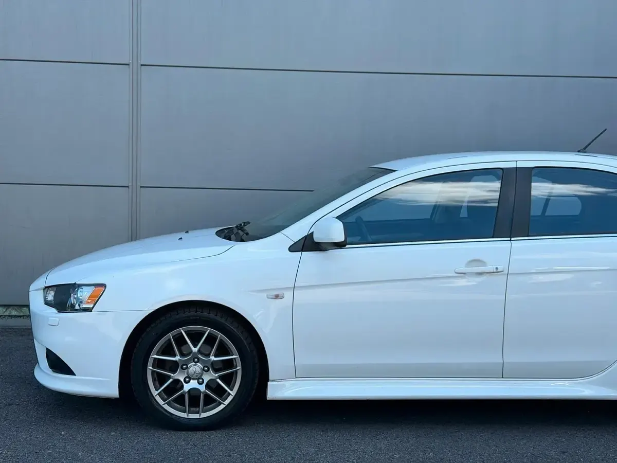 Gebraucht Mitsubishi Lancer 117 PS (86 kW) 2013 Weiß Limousine